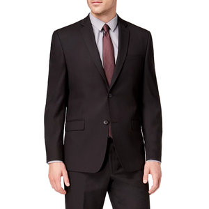 A man is wearing a dark two-button suit with a light-colored dress shirt and a maroon tie.