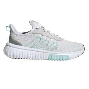 A light gray athletic shoe with a textured upper and turquoise details, featuring a white ribbed sole for cushioning.