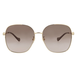 Gucci sunglasses with square, oversized frames feature gold-tone metal and gradient brown lenses. The glasses have thin arms and a subtle Gucci logo on the top corner of one lens.