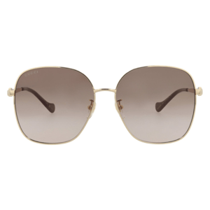 Gucci sunglasses with square, oversized frames feature gold-tone metal and gradient brown lenses. The glasses have thin arms and a subtle Gucci logo on the top corner of one lens.