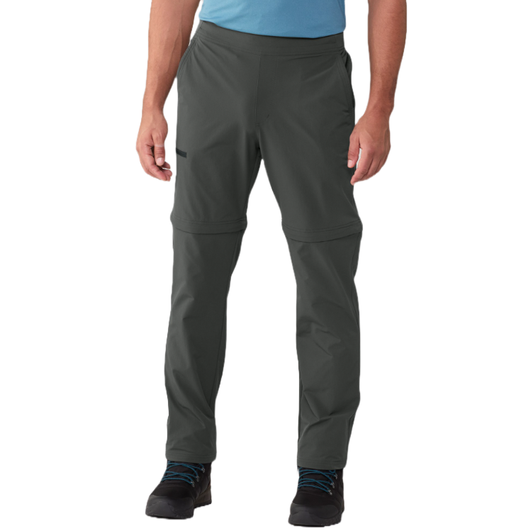 Dark gray convertible hiking pants with zip-off legs, paired with black boots featuring blue laces.