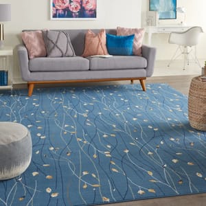 A 5' x 7' blue floral area rug with a delicate pattern of winding stems and small yellow and white flowers, adding a serene touch to the room's decor.