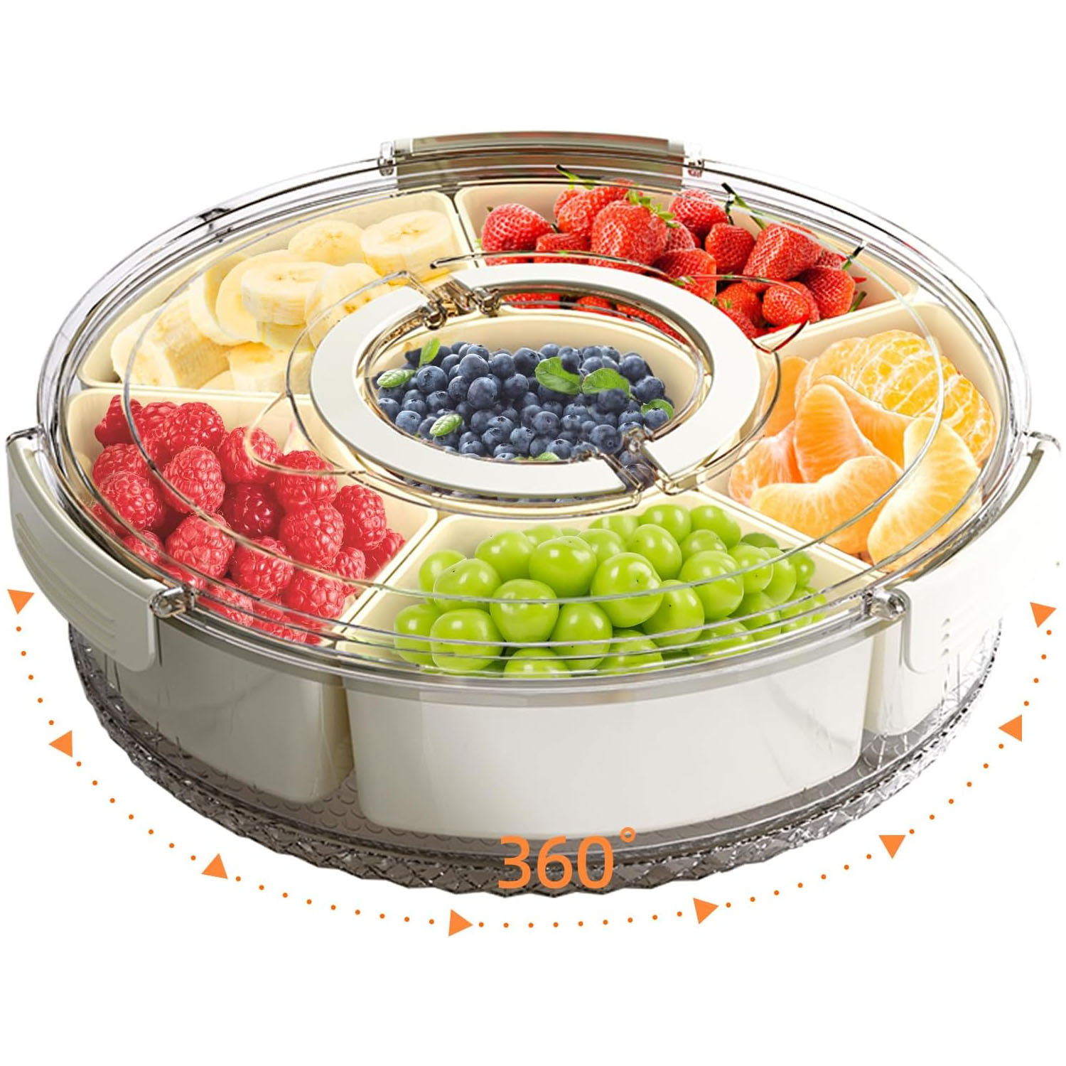 A round, rotating snack tray with a transparent locking lid, featuring six compartments filled with various fruits like strawberries, grapes, blueberries, bananas, raspberries, and orange segments, allowing 360-degree access.