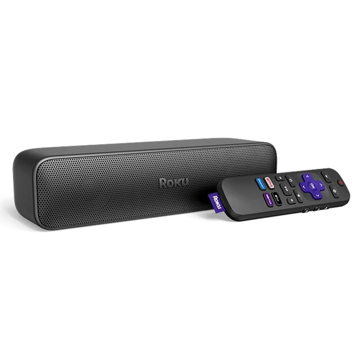 A compact black soundbar with a Roku logo paired with a matching remote control with purple accents and dedicated streaming service buttons.