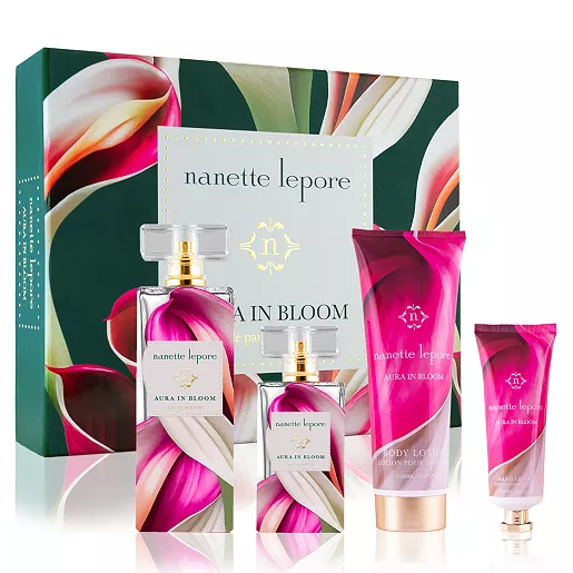 Nanette Lepore Aura in Bloom 4pc Fragrance Set includes a perfume bottle, a mini perfume, a body lotion, and a hand cream, all featuring floral-themed packaging.