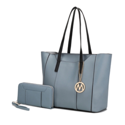 Blue tote bag with black handles and a gold charm, paired with a matching wallet.