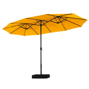 Yellow patio umbrella with a dual canopy design, featuring a central pole and crank mechanism, standing on a black base.