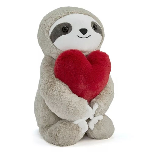 a plushie sloth holding a heart