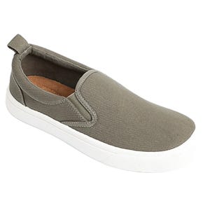Gray slip-on shoe with a white rubber sole, featuring a canvas upper and elastic side panels for easy wearing.