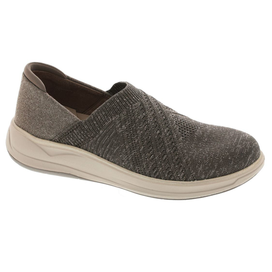 Slip-on shoe with a textured knit upper in grey and a beige sole, featuring a low-profile design for casual wear.