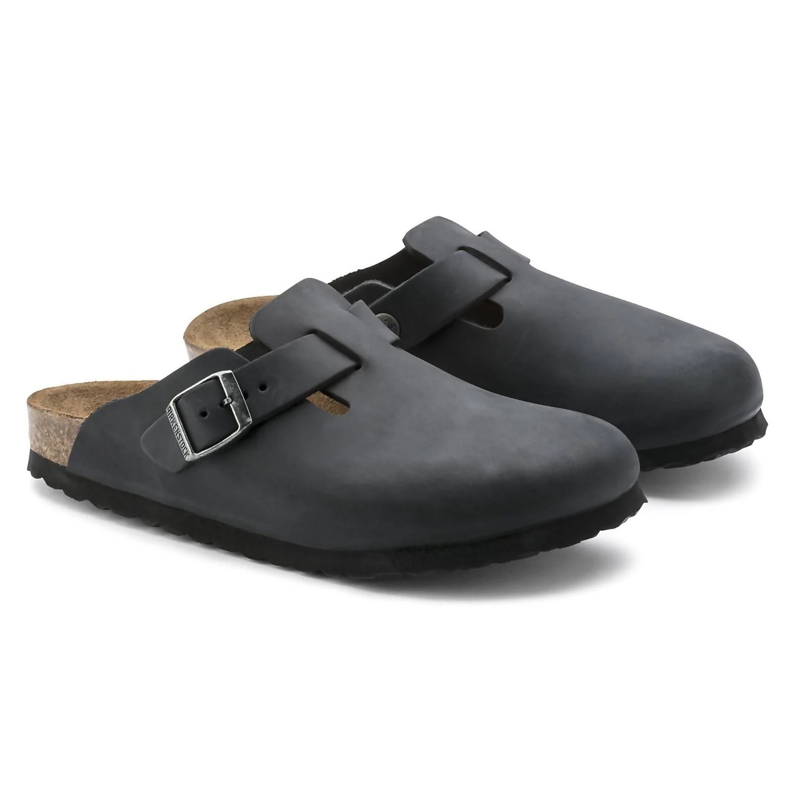 Black slip-on clogs featuring a closed toe, adjustable buckle strap, and a cork footbed with a black rubber sole.