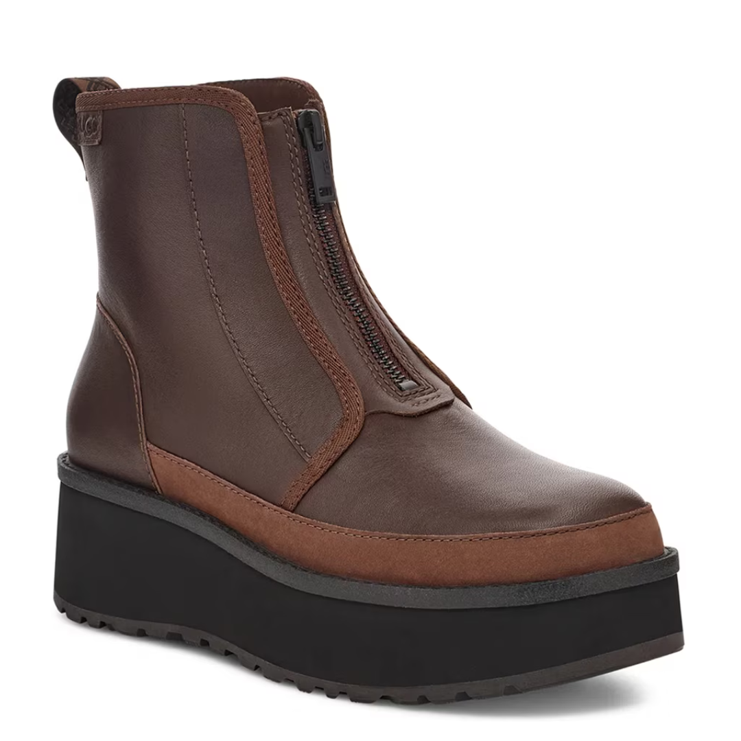 Brown leather zip-up ankle boot with a platform sole and textured tread.