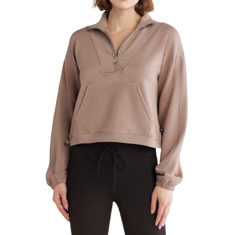 A taupe quarter zip jacket with a high collar and kangaroo pocket, featuring long sleeves with elastic cuffs and a relaxed fit.