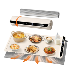 Electric warming mat with digital controls and temperature display, used to keep various foods and beverages warm, including soup, seafood, coffee, fries, and pasta.