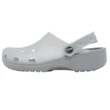 A white Crocs clog with ventilation holes, a pivoting heel strap, and a textured sole for grip.