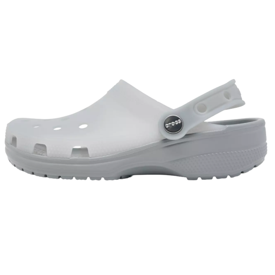 A white Crocs clog with ventilation holes, a pivoting heel strap, and a textured sole for grip.