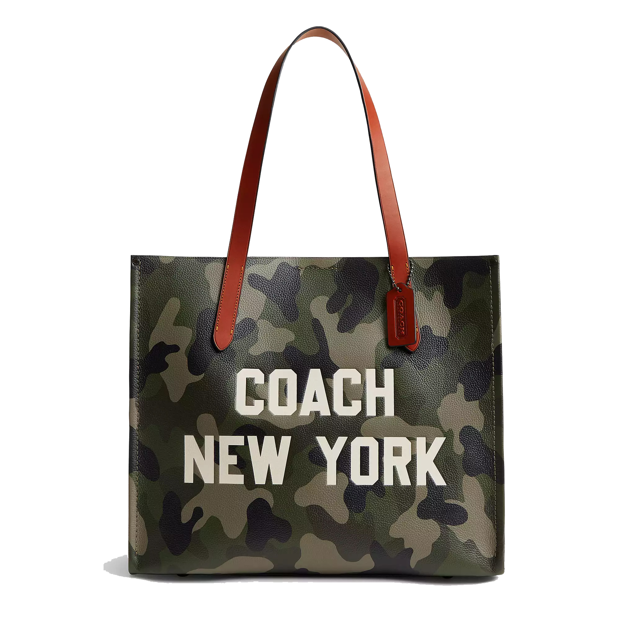Coach New York tote bag with a camouflage pattern and brown leather handles, featuring prominent white text and a leather tag.