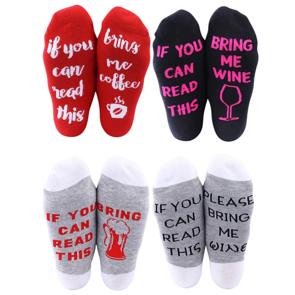 Four pairs of ankle socks with humorous messages: red pair says \“if you can read this, bring me coffee,\“ black pair says \“if you can read this, bring me wine,\“ and two gray pairs say similar messages with beer or wine themes.