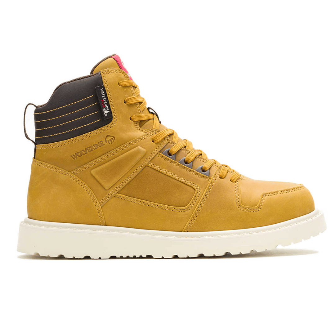 Yellow high-top work boot with a brown collar, white sole, and lace-up design, featuring the brand name \“Wolverine\“ embossed on the side.
