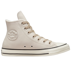 A high-top sneaker with a light beige leather upper, featuring a classic design with the Converse All Star logo embossed on the side, white rubber toe cap, and a black-striped white rubber sole.