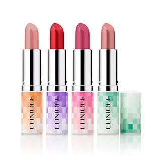 Four Clinique lipsticks in shades of nude, red, pink, and mauve, each with a distinctive pixelated design on the casing in colors like orange, purple, pink, and mint green.