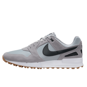 A light grey sneaker with a black swoosh, featuring suede overlays and a gum sole.