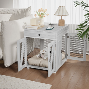 A dual-purpose end table doubles as a dog crate with mesh doors, housing a dog on a cushion. The top surface holds a lamp, books, a speaker, and a phone.
