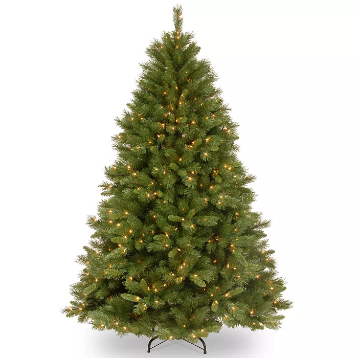 A pre-lit artificial Christmas tree with green branches and warm white lights, standing on a metal base.