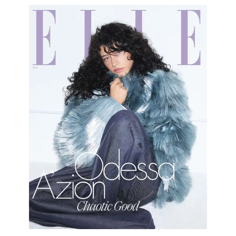 A fashion magazine cover features a person in a light blue faux fur coat and dark pants, with the name Odessa A'zion and the phrase \“Chaotic Good\“ displayed prominently.