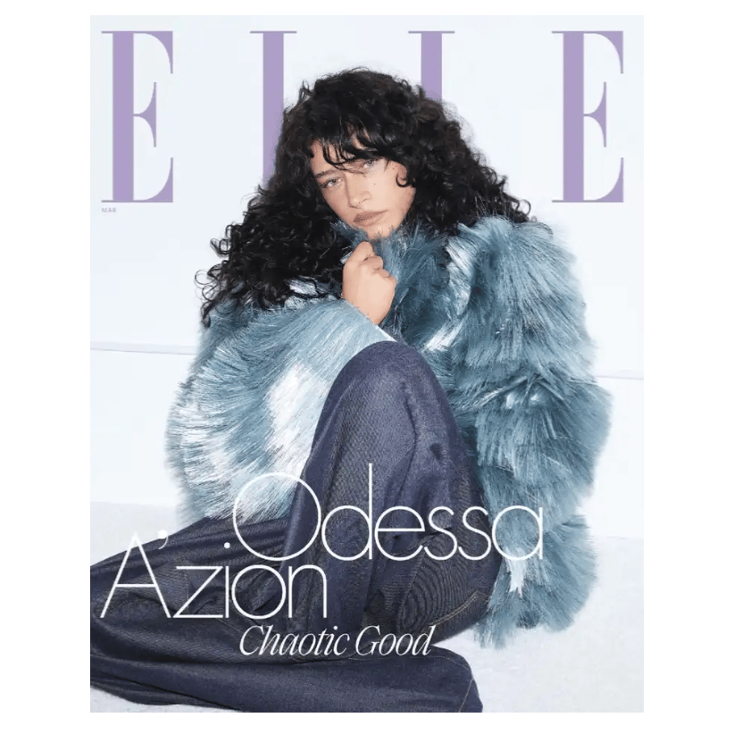 A fashion magazine cover features a person in a light blue faux fur coat and dark pants, with the name Odessa A'zion and the phrase \“Chaotic Good\“ displayed prominently.