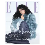 A fashion magazine cover features a person in a light blue faux fur coat and dark pants, with the name Odessa A'zion and the phrase \“Chaotic Good\“ displayed prominently.