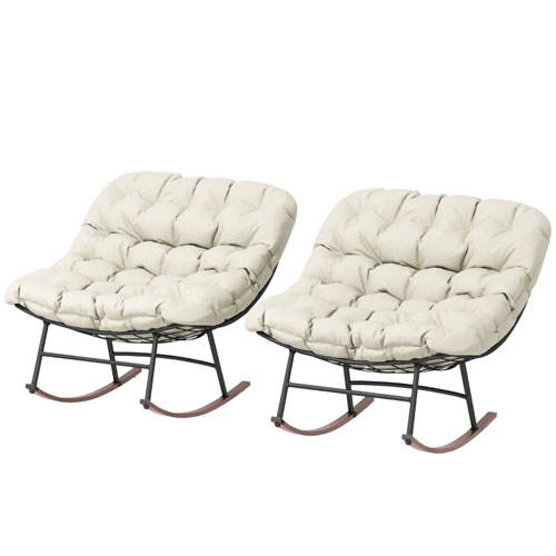 Two beige tufted cushioned rocking chairs with metal frames and wooden rockers.