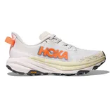 A HOKA trail running shoe with a white and orange color scheme, featuring a Vibram sole for enhanced traction.
