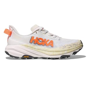 A HOKA trail running shoe with a white and orange color scheme, featuring a Vibram sole for enhanced traction.