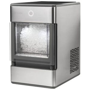 A stainless steel countertop ice maker with a clear front display, showing a bin full of nugget ice.