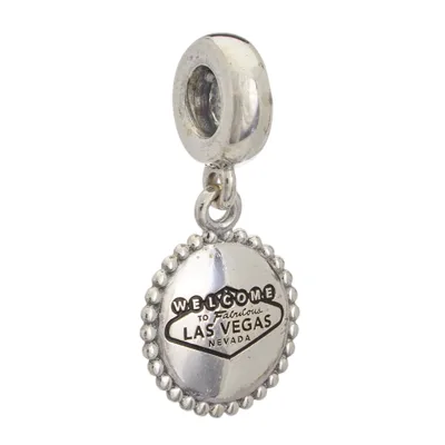 A silver charm with a design inspired by the \“Welcome to Fabulous Las Vegas, Nevada\“ sign, featuring a beaded border and a hole for attaching to a bracelet or necklace.