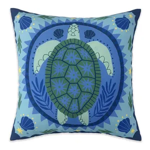 Square pillow featuring a sea turtle design in shades of blue and green, accented with star and shell motifs around the edges.