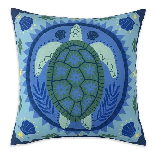 Square pillow featuring a sea turtle design in shades of blue and green, accented with star and shell motifs around the edges.