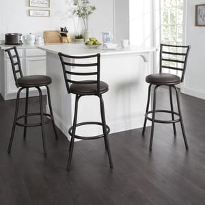 Two brown bar stools with metal frames beside a kitchen island.