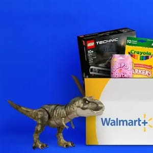 A LEGO Technic box, Crayola markers, a Barbie doll, and a toy dinosaur alongside a Walmart+ box.