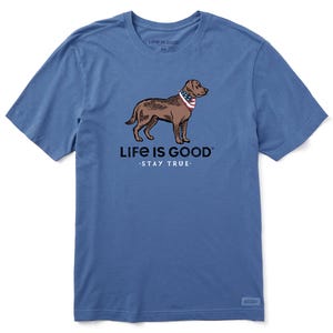 Blue short-sleeve t-shirt featuring a brown dog wearing a bandana, with the text \“Life is Good\“ and \“Stay True\“ below the graphic.