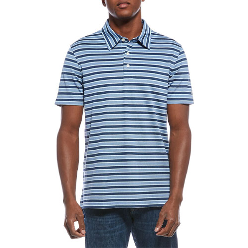 A man is wearing a blue and white striped polo shirt paired with dark jeans.