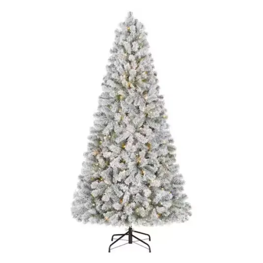 A frosted artificial Christmas tree with a full, conical shape, featuring pre-lit warm white lights and a sturdy metal stand.