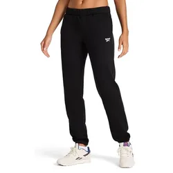 Black Reebok sweatpants with the logo on the left thigh, paired with white Reebok sneakers featuring blue and purple accents.