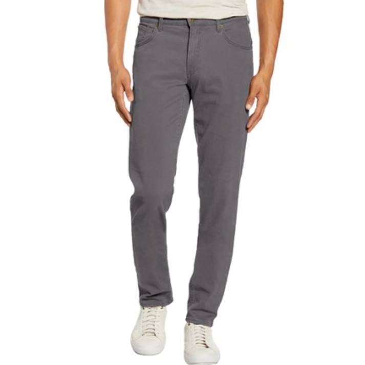 Gray stretch chinos with a slim fit and classic five-pocket design, paired with white sneakers.