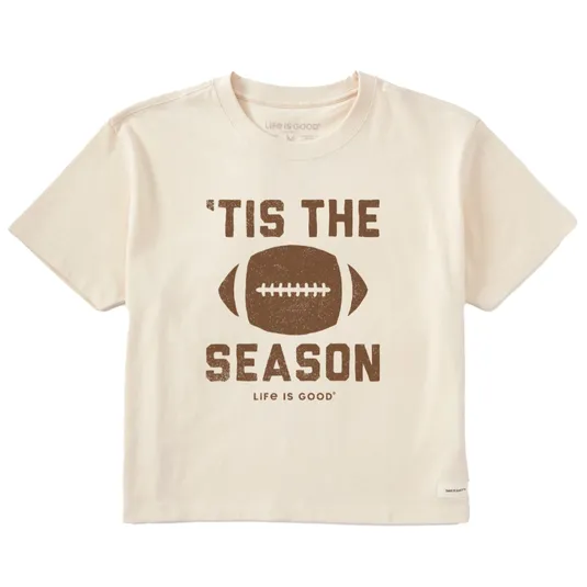 Cream-colored T-shirt featuring a football graphic with the text \“'Tis the Season\“ and \“Life Is Good\“ underneath.