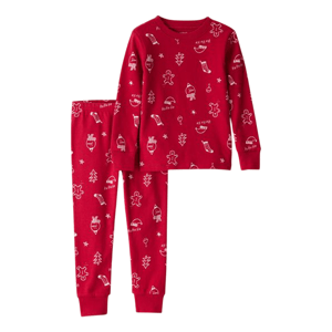 Red children's pajamas with holiday-themed white illustrations, including gingerbread men, stockings, trees, and Santa hats, featuring long sleeves and pants.