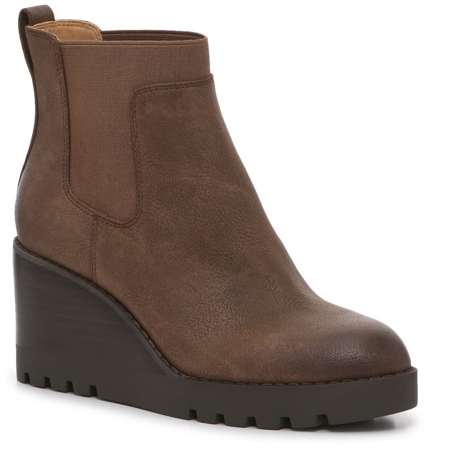 Brown wedge Chelsea boots with elastic side panels and a chunky lug sole.
