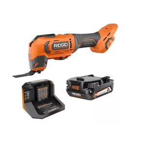RIDGID cordless oscillating multi-tool kit includes an orange and black oscillating tool, a 2 Ah lithium-ion battery, and a charger.