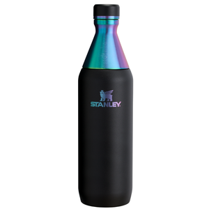 Stanley black bottle with a rainbow-colored neck and cap, featuring the Stanley logo.